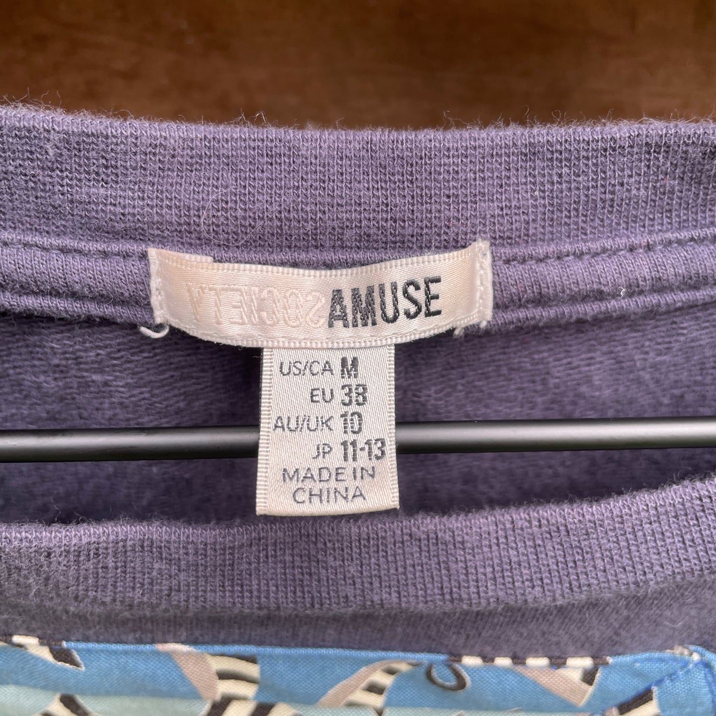 A close up of the tagging showing size medium
