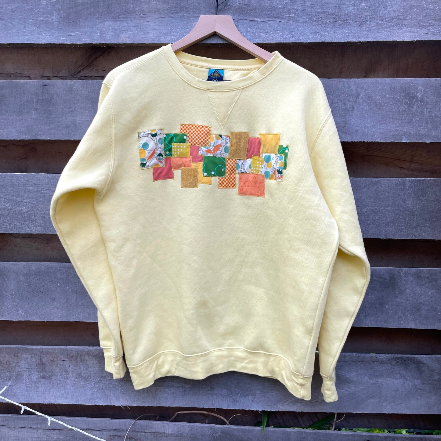 Yellow Sweatshirt with Abstract Appliqué (size M)