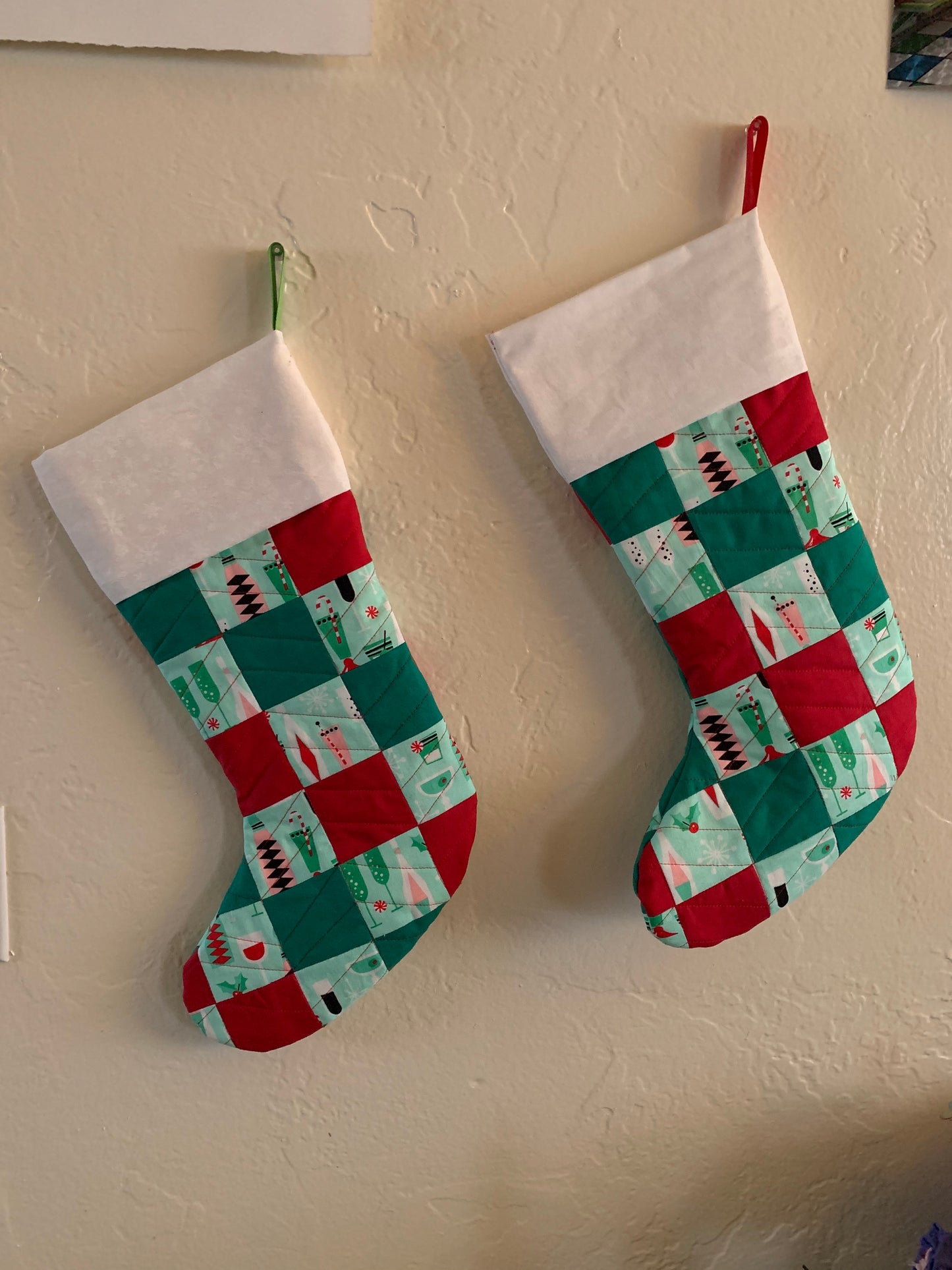 Christmas stockings with alternating red and green patchwork