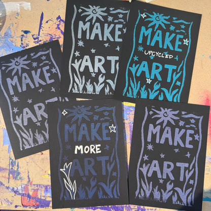 Multiple black cards with purple and silver text reading "Make Art"