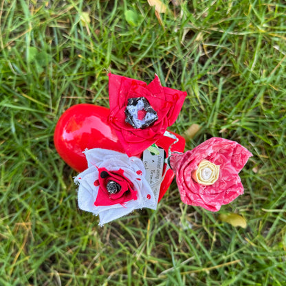 Decorative flowers on a grassy background