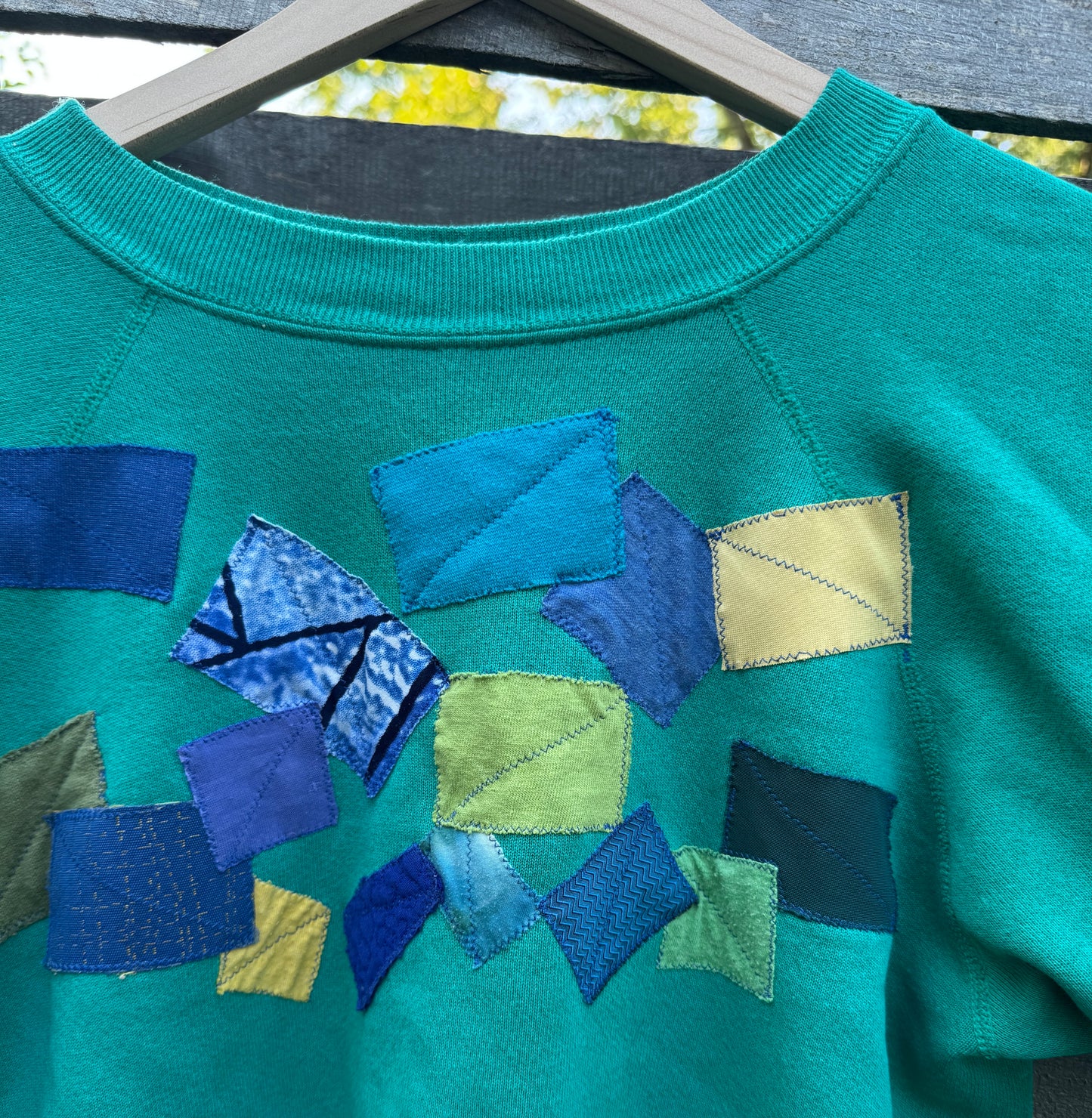 Green Sweatshirt with Abstract Appliqué (size M)