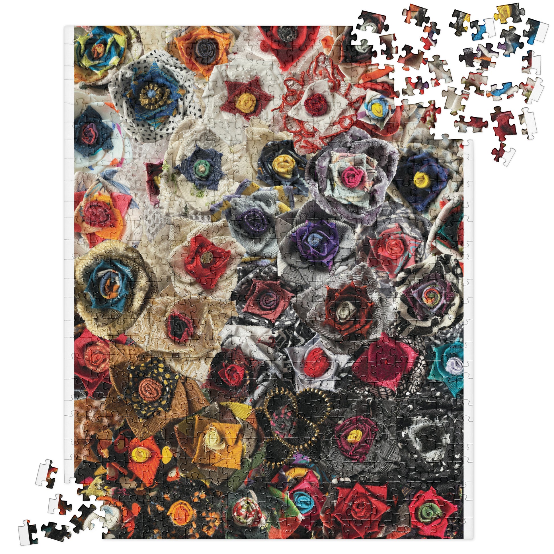 Puzzle with a black, white, and red gradient of fabric flowers