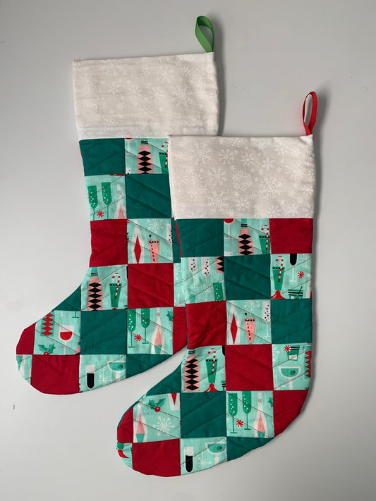 Christmas stockings with alternating red and green patchwork